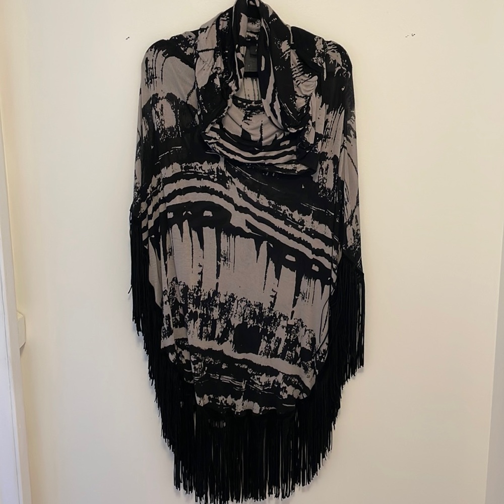 Woman’s  poncho.   Lightweight